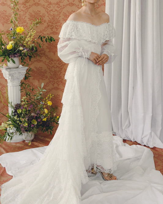 VINTAGE OFF-THE-SHOULDER LACE BRIDAL GOWN WITH TIERED WATTEAU-STYLE TRAIN
